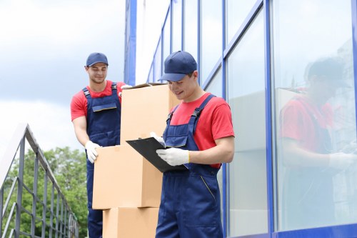 Trained movers handling items carefully during relocation