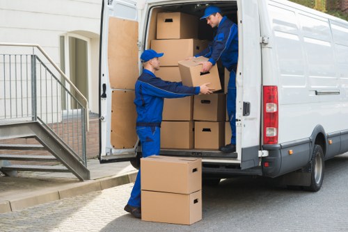 Man with a van service loading furniture in Pimlico