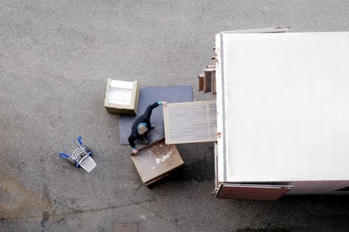 Packed boxes and furniture prepared for a local move in Pimlico