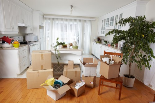 Packed furniture and moving boxes inside a removals van