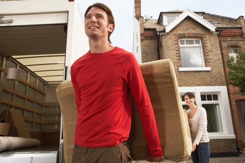 Moving van and packing boxes for a home move in Pimlico