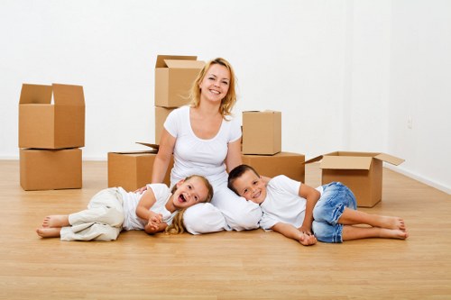 Packed boxes and furniture ready for a flat move in Pimlico
