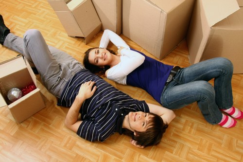 Professional movers packing household furniture for a Pimlico relocation